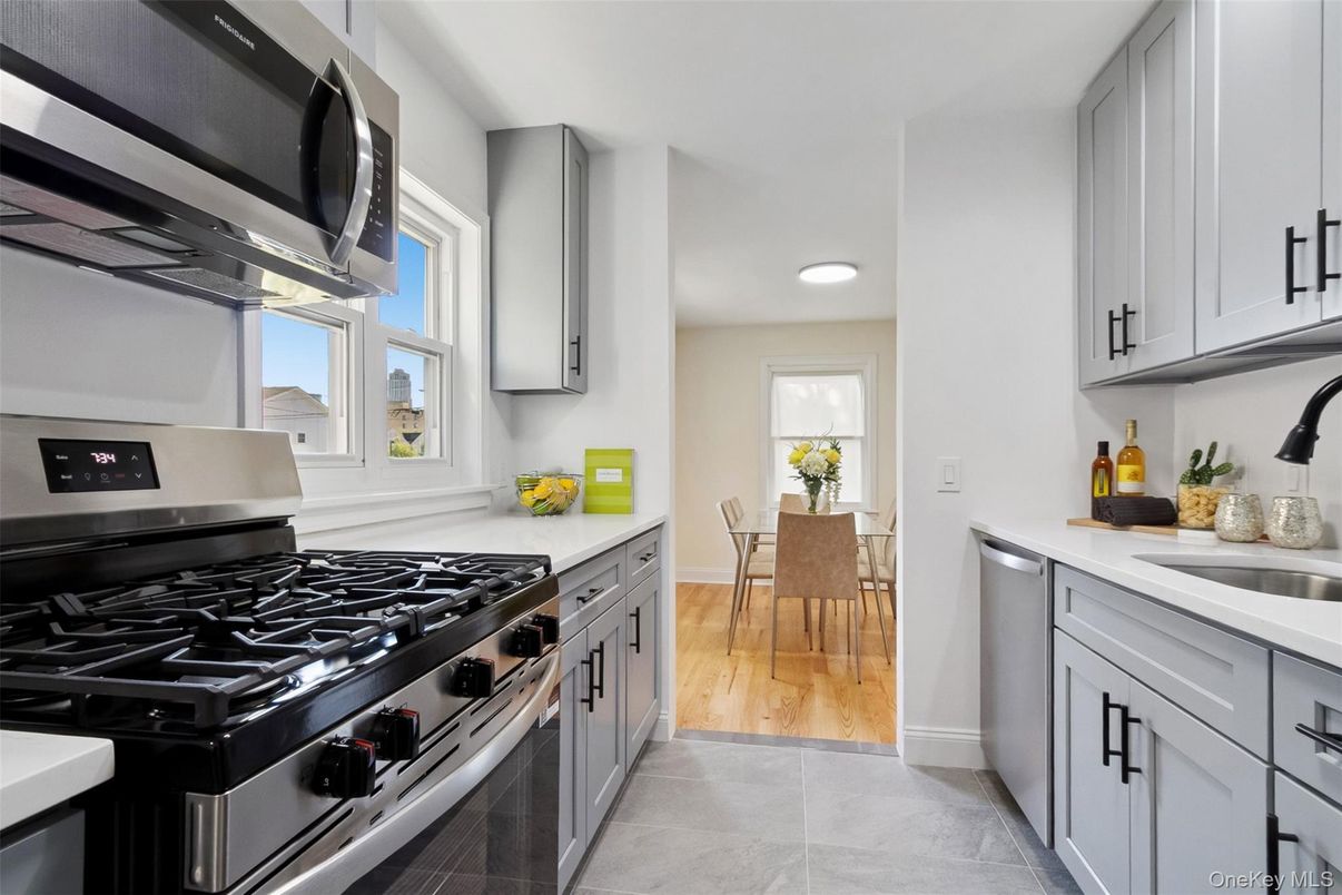 Dining room, Interior, Kitchen, Recessed Lighting, Stainless Steel Appliances, Wood Texture Flooring