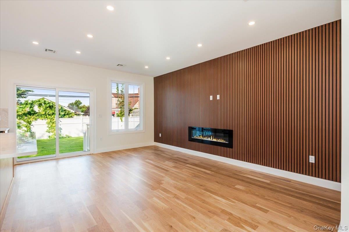 Empty room, Fireplace, Interior, Recessed Lighting, Wood Texture Flooring