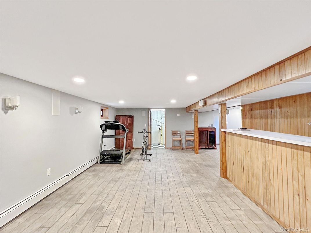 Fitness Equipment, Interior, Recessed Lighting, Wood Texture Flooring, Wooden Walls