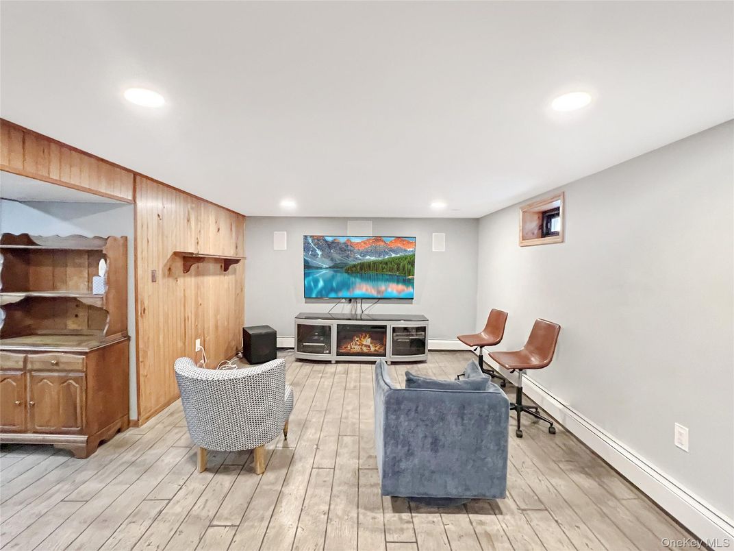 Fireplace, Interior, Living room, Recessed Lighting, Wood Texture Flooring, Wooden Walls