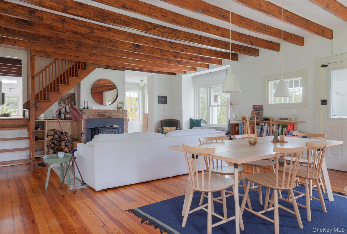 Dining room, Fireplace, Interior, Living room, Pendant Lights, Wooden Beams, Wood Texture Flooring