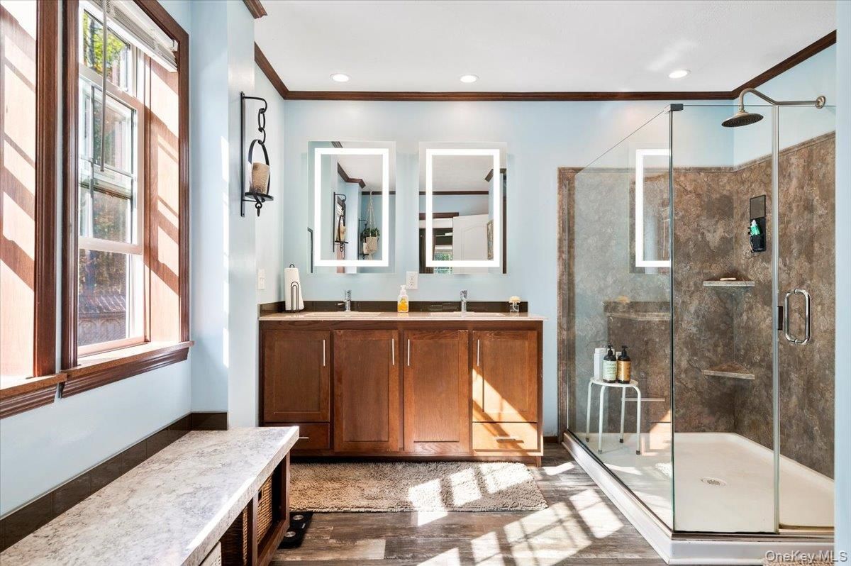 Bathroom, Dual Sink Vanities, Glass Shower, Interior, Recessed Lighting, Wood Texture Flooring
