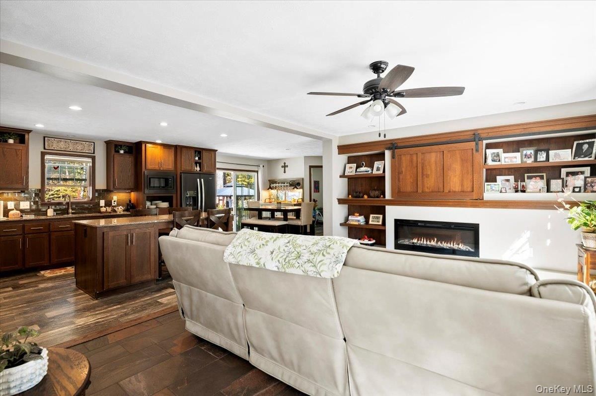 Fireplace, Interior, Kitchen, Living room, Recessed Lighting, Wood Texture Flooring