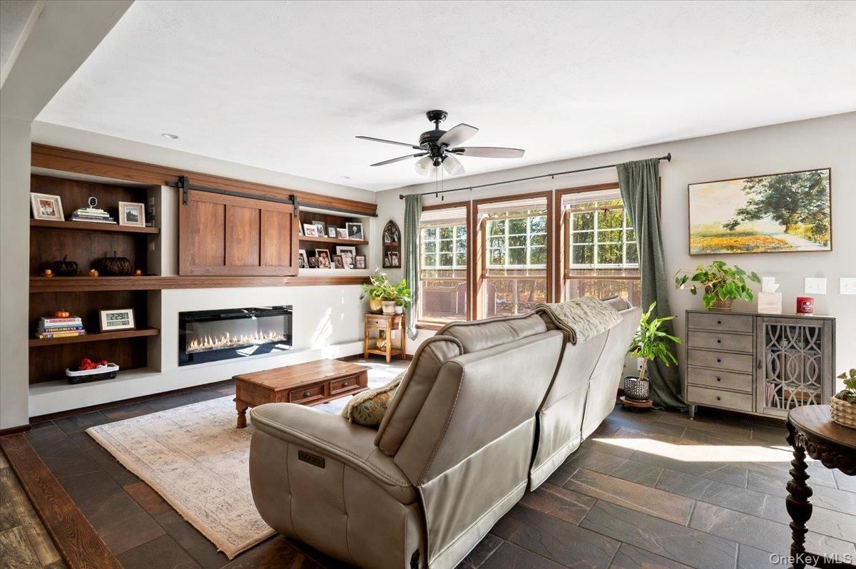 Fireplace, Interior, Living room, Recessed Lighting, Wood Texture Flooring