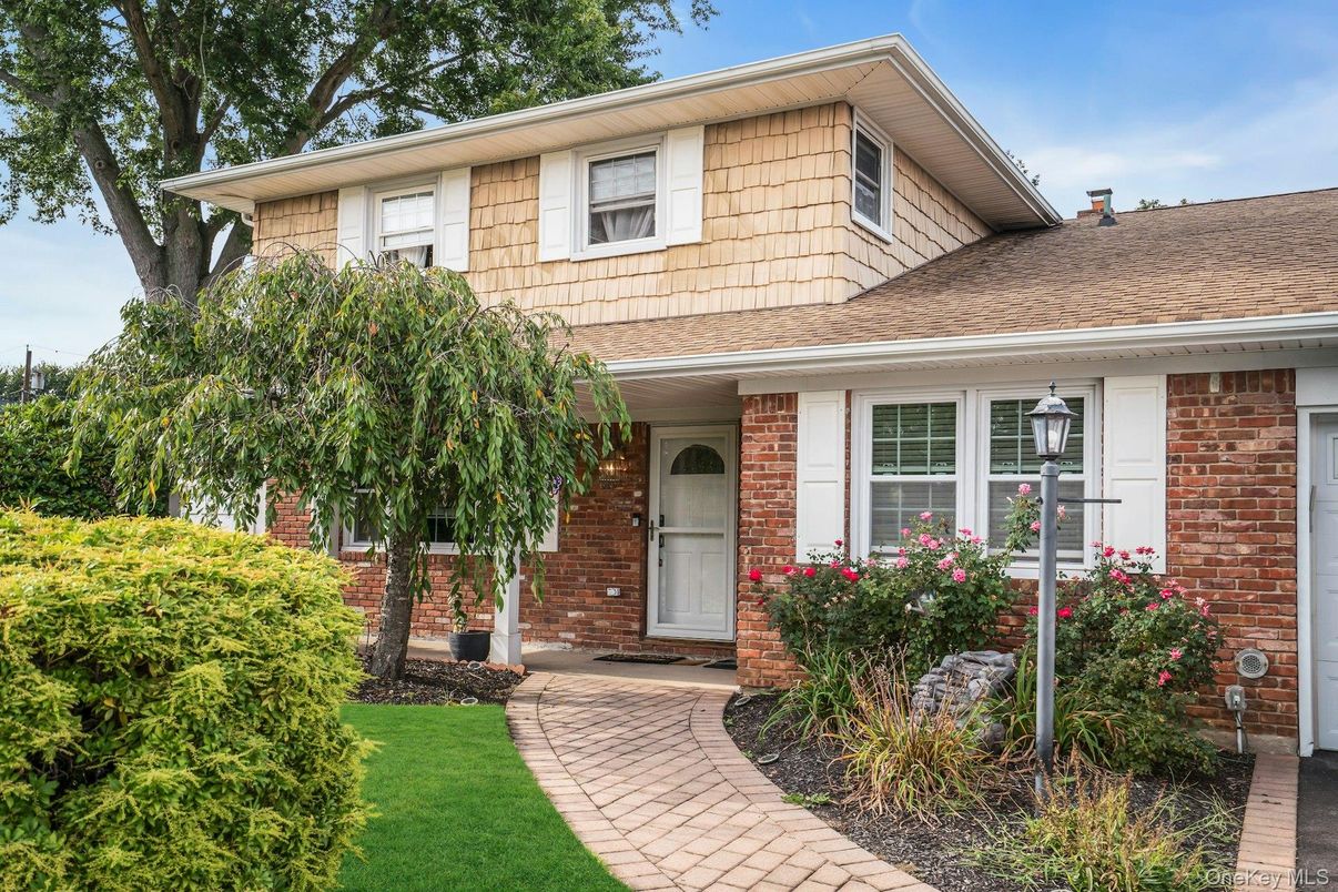 Exterior, Facade, Brick Facade, Split Level