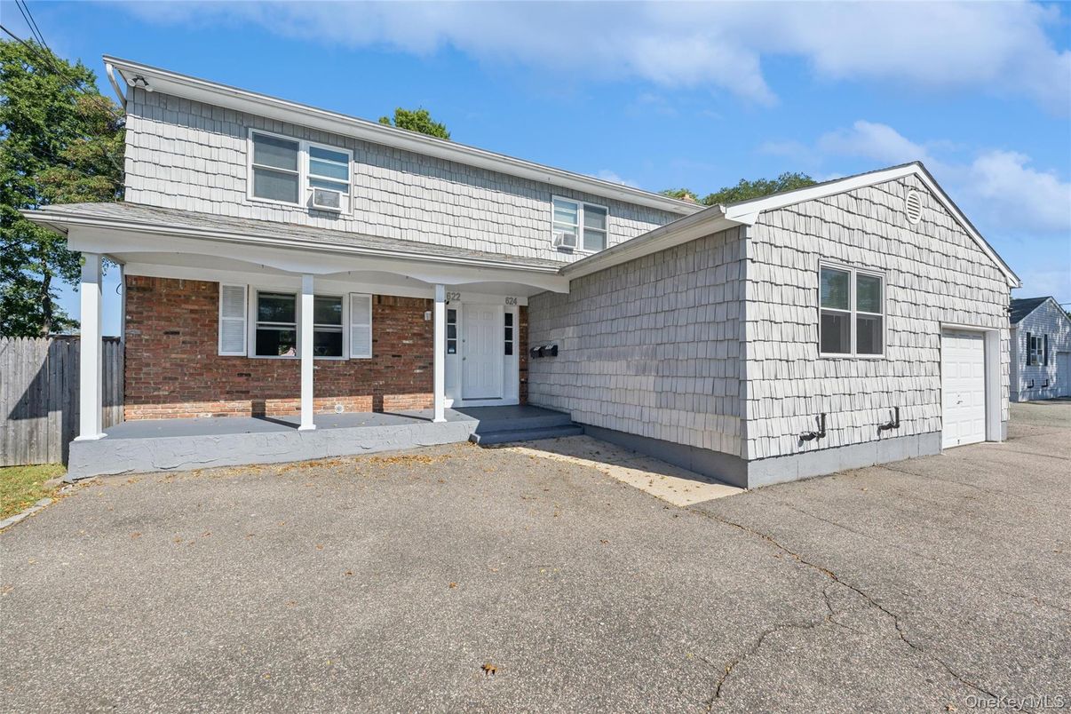 Attached, Exterior, Facade, Brick Facade, None