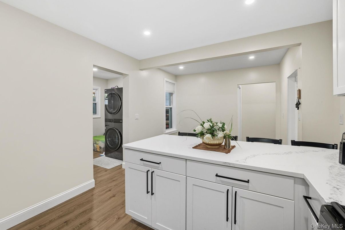 Interior, Kitchen, Recessed Lighting, Washer, Wood Texture Flooring