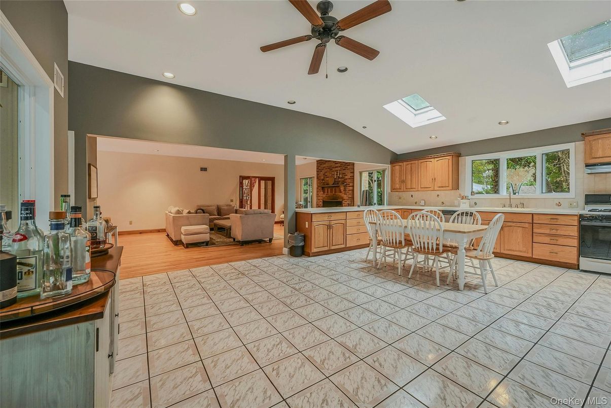 Dining room, Interior, Kitchen, Living room, Recessed Lighting, Stainless Steel Appliances, Wood Texture Flooring