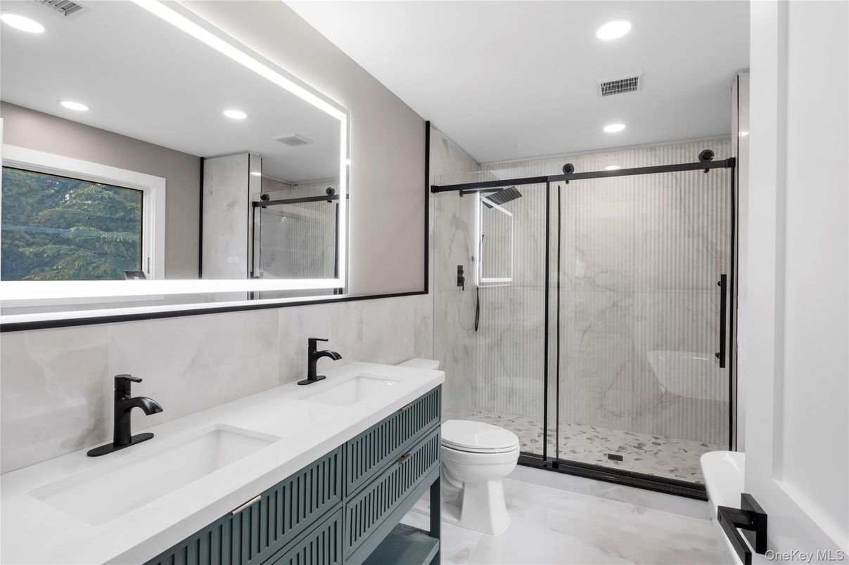 Bathroom, Dual Sink Vanities, Glass Shower, Interior, Recessed Lighting