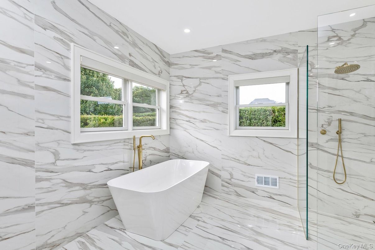 Bathroom, Free Standing Baths, Glass Shower, Interior, Marble, Marble Walls, Recessed Lighting