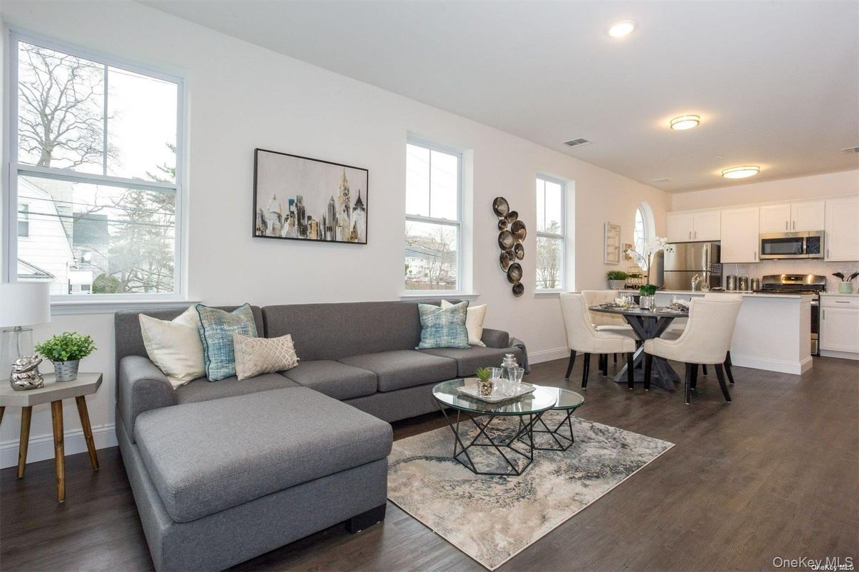 Dining room, Interior, Kitchen, Living room, Recessed Lighting, Stainless Steel Appliances, Wood Texture Flooring