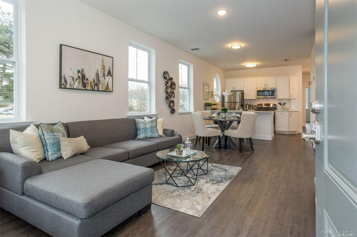 Dining room, Interior, Kitchen, Living room, Recessed Lighting, Stainless Steel Appliances, Wood Texture Flooring