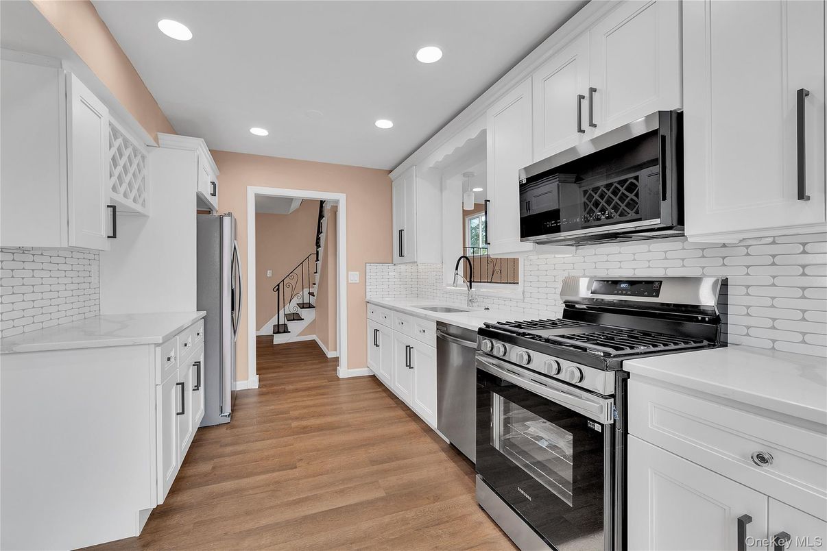 Interior, Kitchen, Recessed Lighting, Stainless Steel Appliances, Wood Texture Flooring