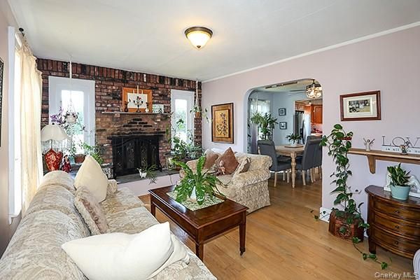 Dining room, Fireplace, Interior, Living room, Stone Walls, Wood Texture Flooring