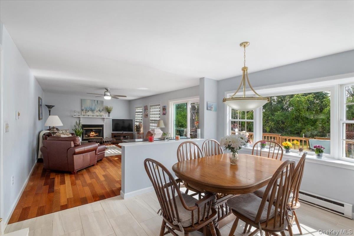 Dining room, Fireplace, Interior, Living room, Pendant Lights, Wood Texture Flooring