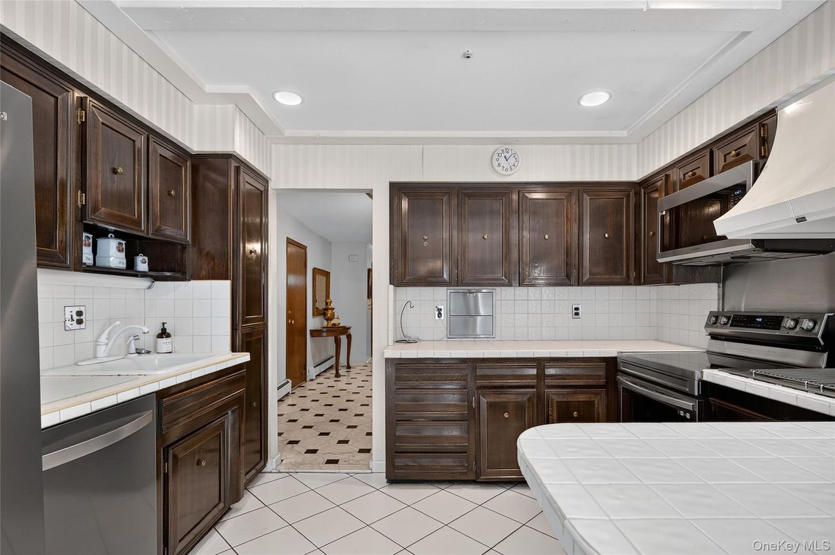 Interior, Kitchen, Recessed Lighting, Stainless Steel Appliances, Tile Countertops