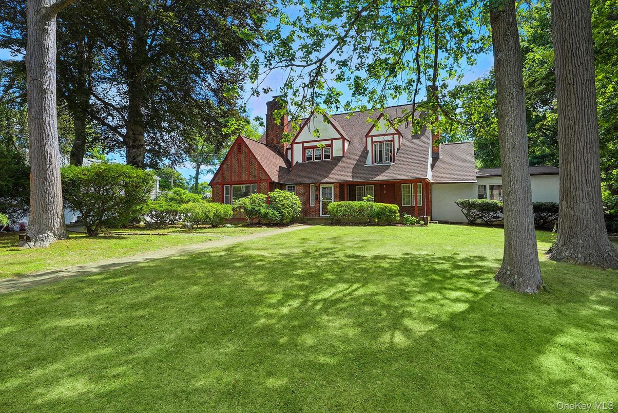 Attached, Backyard, Exterior, Facade, Brick Facade, Tudor Revival