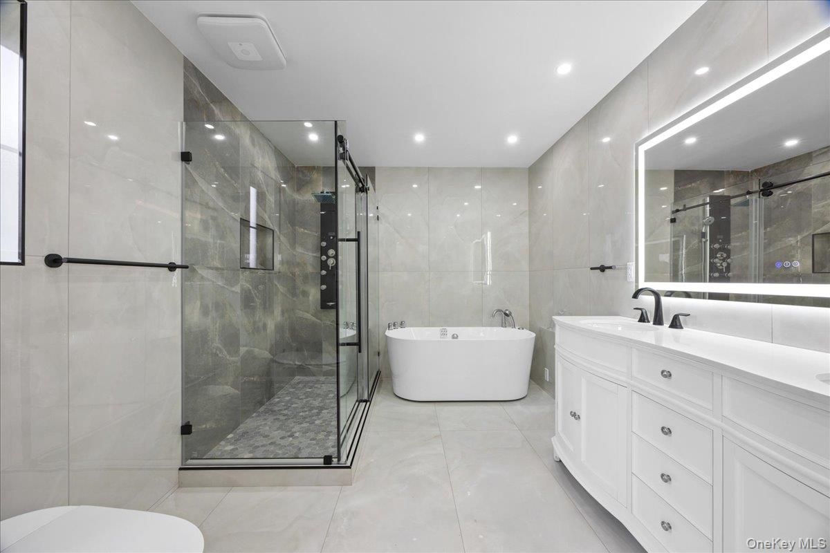 Bathroom, Dual Sink Vanities, Free Standing Baths, Glass Shower, Interior, Recessed Lighting