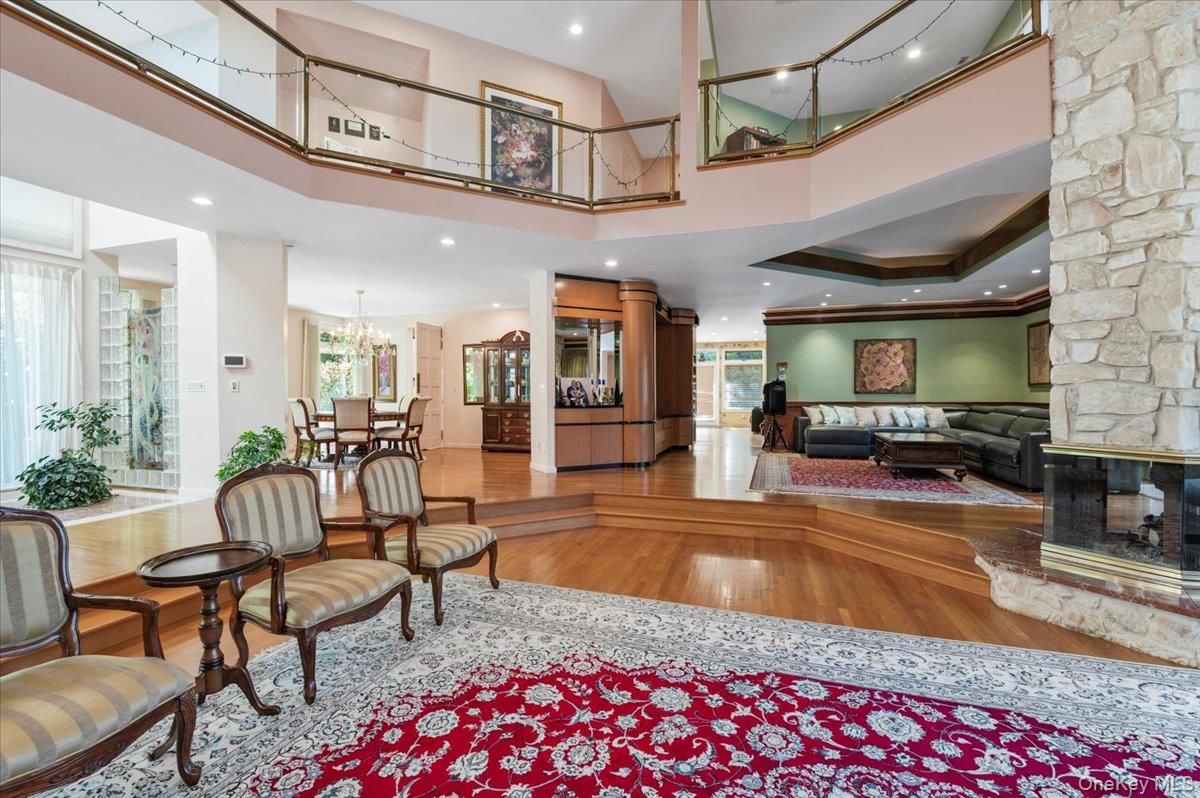 Chandelier, Dining room, Fireplace, Interior, Living room, Recessed Lighting, Wood Texture Flooring