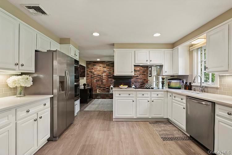 Interior, Kitchen, Recessed Lighting, Stainless Steel Appliances, Stone Walls, Wood Texture Flooring