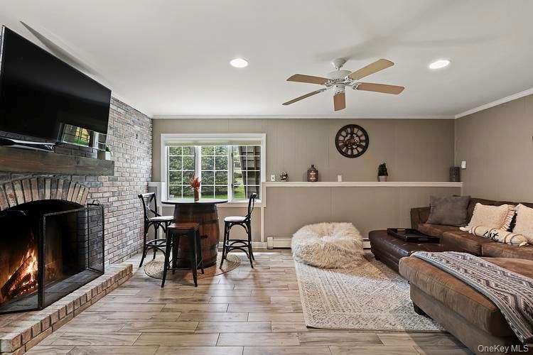 Fireplace, Interior, Recessed Lighting, Stone Walls, Wood Texture Flooring