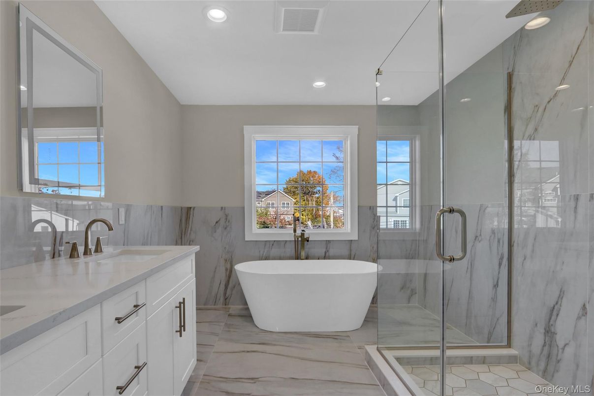 Bathroom, Free Standing Baths, Glass Shower, Interior, Marble, Marble Walls, Recessed Lighting