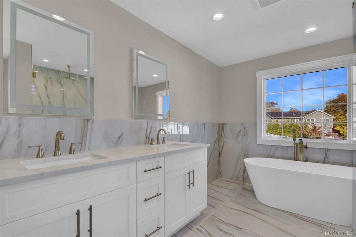 Bathroom, Dual Sink Vanities, Free Standing Baths, Interior, Marble, Marble Walls, Recessed Lighting