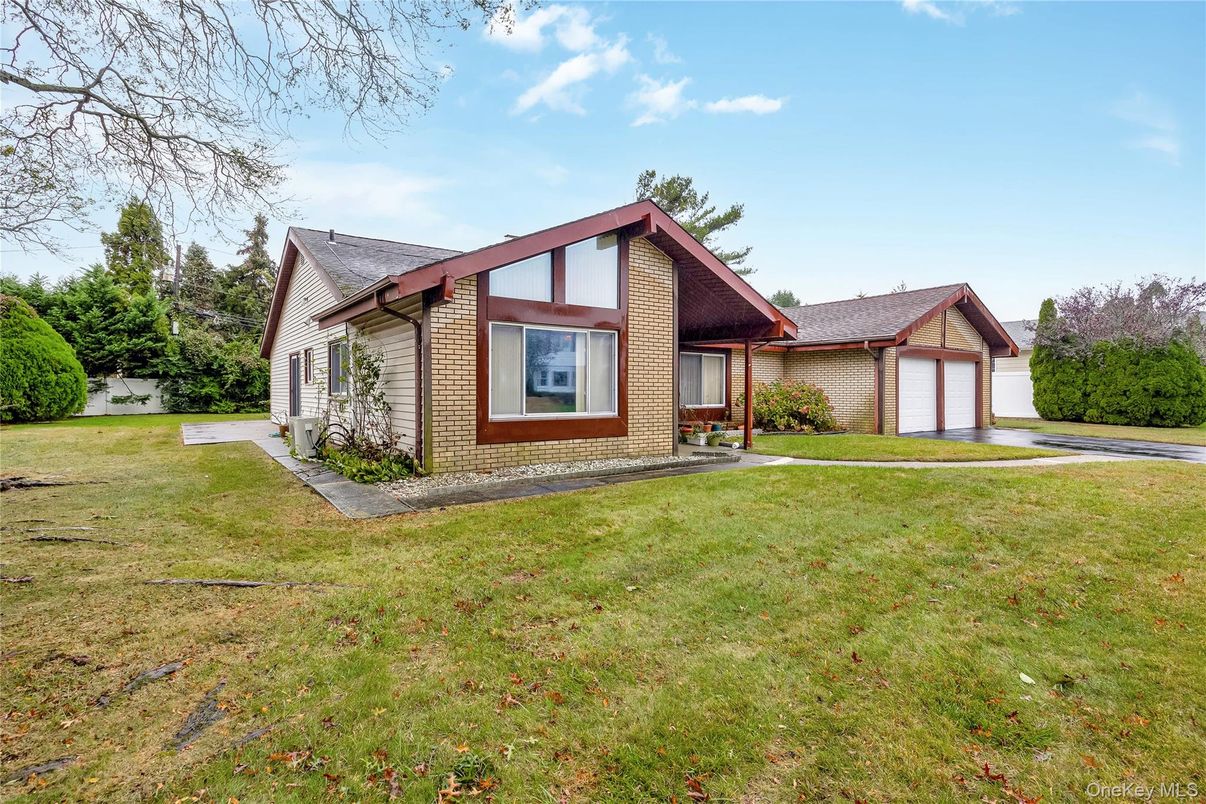 Attached, Backyard, Exterior, Facade, Brick Facade, Tudor Revival