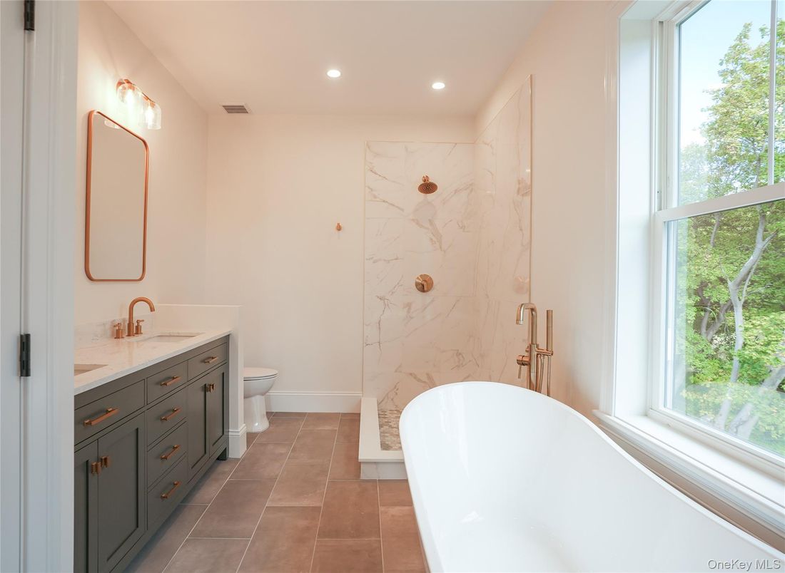 Bathroom, Dual Sink Vanities, Free Standing Baths, Interior, Marble Walls, Recessed Lighting