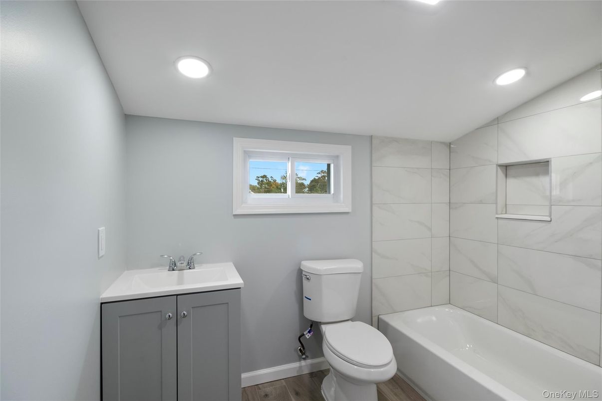 Bathroom, Interior, Marble Walls, Recessed Lighting, Wood Texture Flooring