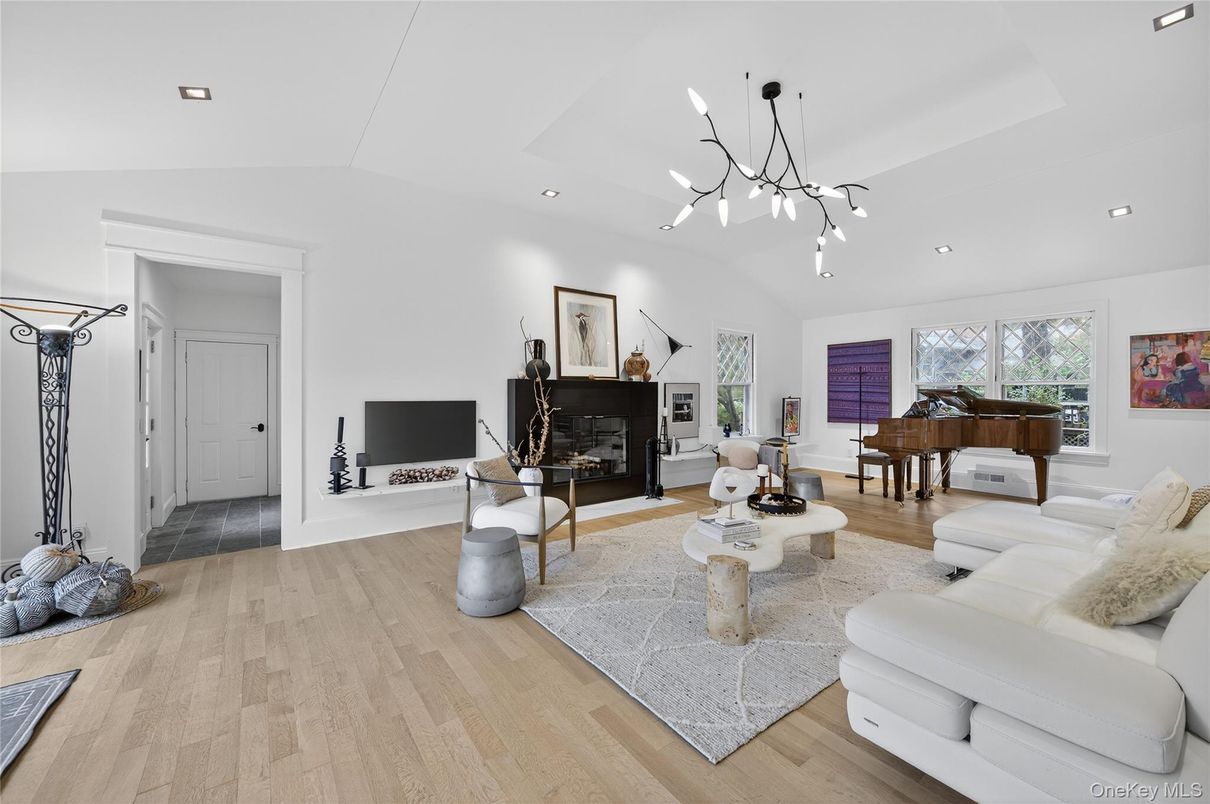 Fireplace, Interior, Living room, Pendant Lights, Piano, Recessed Lighting, Wood Texture Flooring