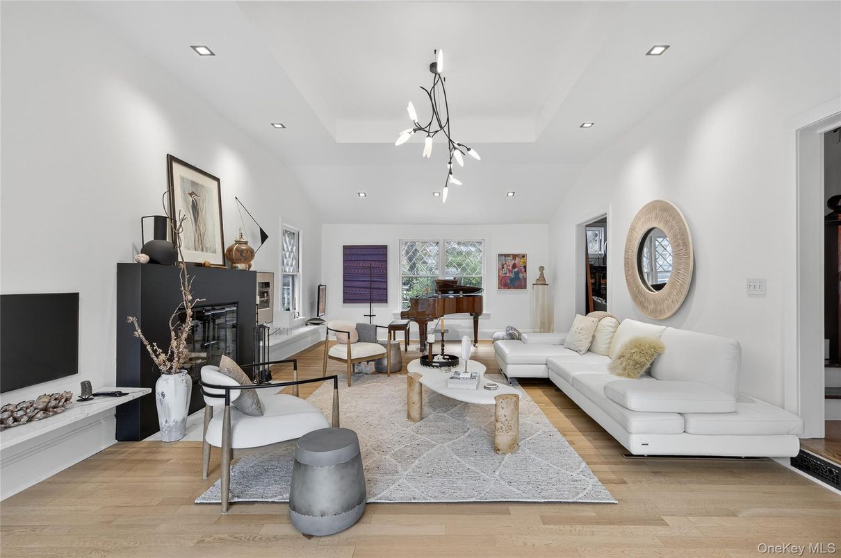 Fireplace, Interior, Living room, Pendant Lights, Piano, Recessed Lighting, Wood Texture Flooring