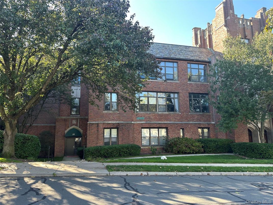 Exterior, Facade, Brick Facade, Condo Building