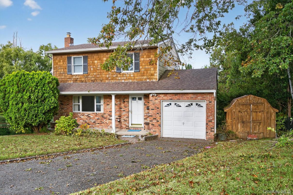 Attached, Exterior, Facade, Brick Facade, Cape Cod