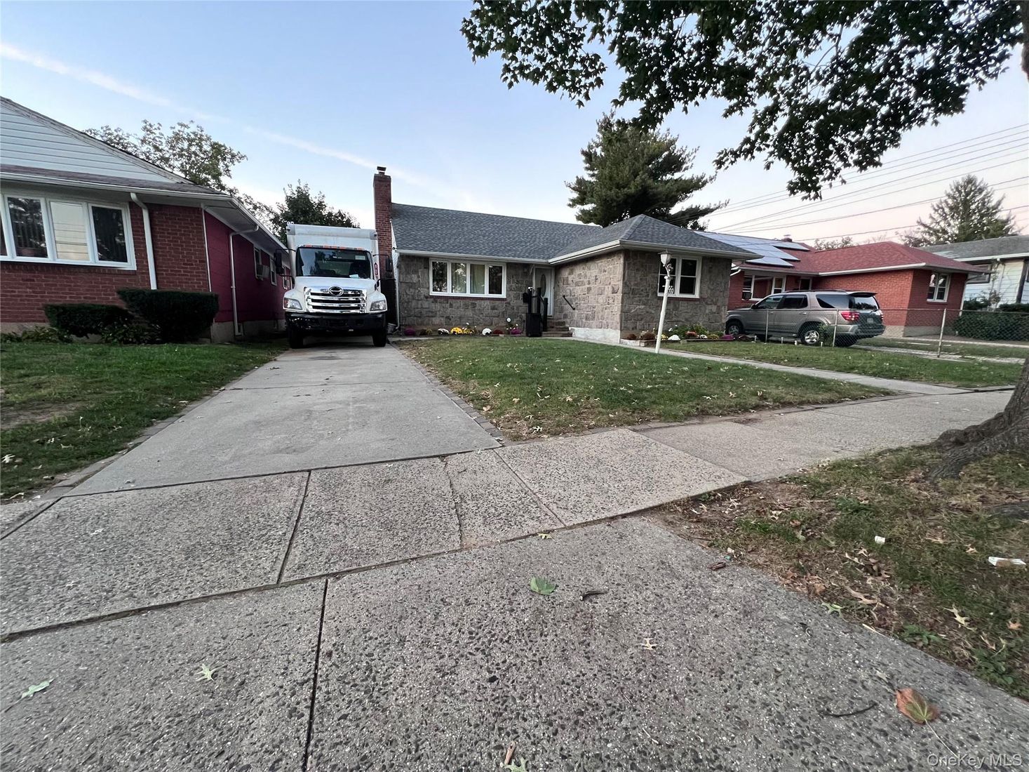 Exterior, Facade, Brick Facade, Cape Cod