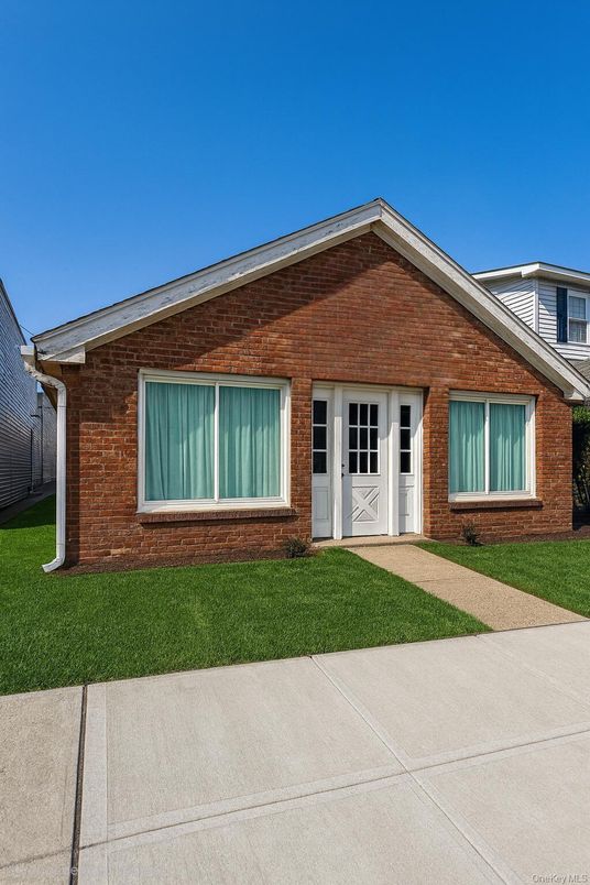 Attached, Exterior, Facade, Brick Facade, Brick Traditional