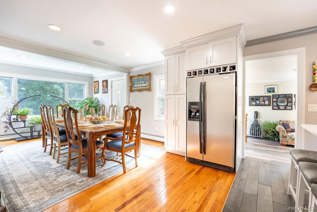 Dining room, Interior, Kitchen, Recessed Lighting, Stainless Steel Appliances, Wood Texture Flooring