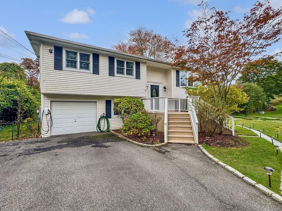 Attached, Exterior, Facade, Raised Ranch