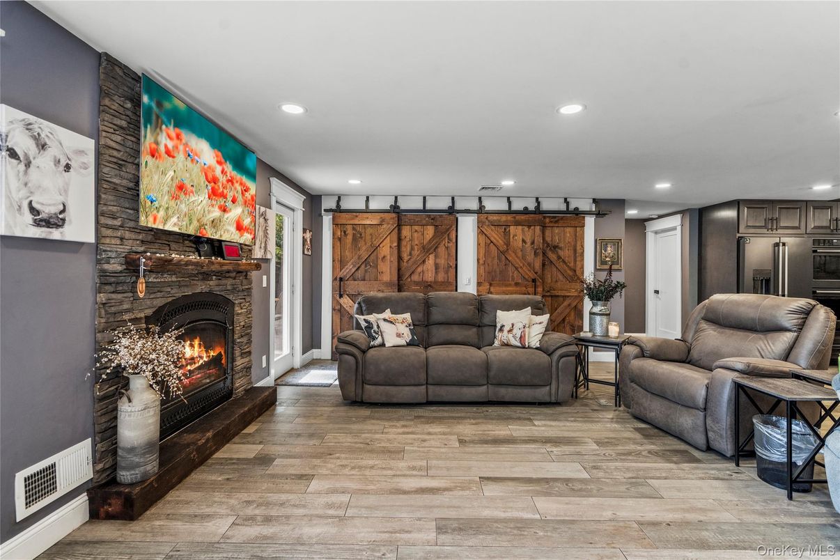 Fireplace, Interior, Living room, Recessed Lighting, Wood Texture Flooring