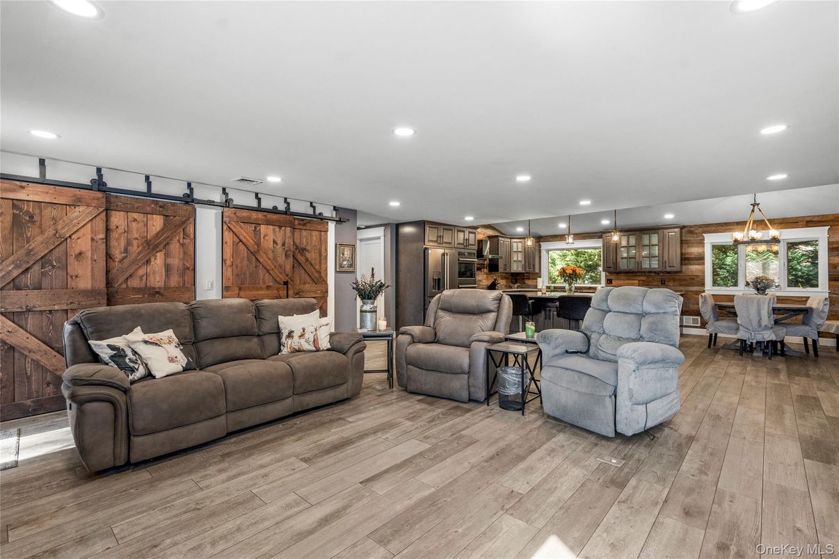 Dining room, Interior, Kitchen, Living room, Pendant Lights, Recessed Lighting, Stainless Steel Appliances, Wood Texture Flooring