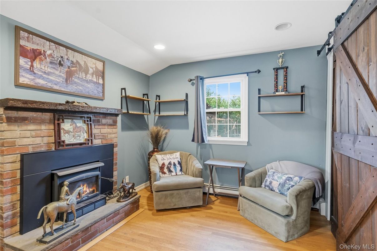 Fireplace, Interior, Recessed Lighting, Stone Walls, Wood Texture Flooring