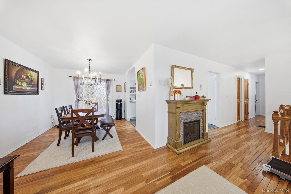 Chandelier, Dining room, Fireplace, Interior, Recessed Lighting, Wood Texture Flooring