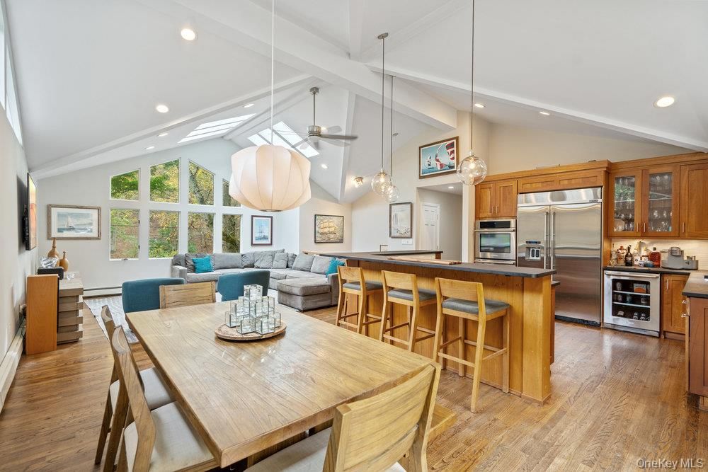 Dining room, Interior, Kitchen, Living room, Pendant Lights, Recessed Lighting, Stainless Steel Appliances, Wood Texture Flooring