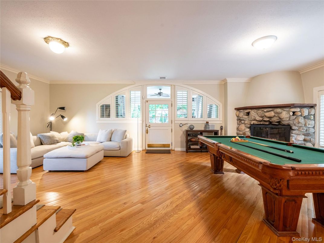 Billiard Table, Fireplace, Game Room, Interior, Living room, Wood Texture Flooring