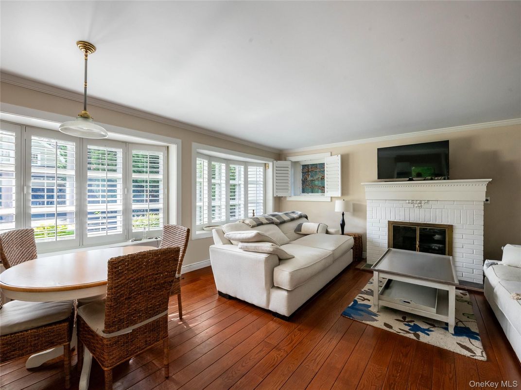 Dining room, Fireplace, Interior, Living room, Pendant Lights, Wood Texture Flooring