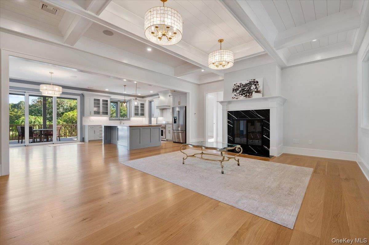 Chandelier, Fireplace, Interior, Kitchen, Pendant Lights, Recessed Lighting, Wood Texture Flooring