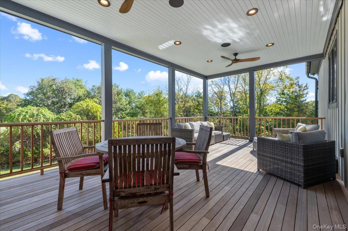 Exterior, Interior, Recessed Lighting, Sun Room, Wood Texture Flooring