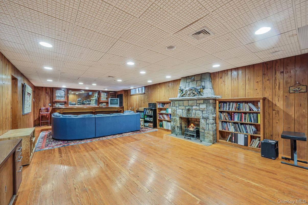 Fireplace, Interior, Recessed Lighting, Wood Texture Flooring, Wooden Walls