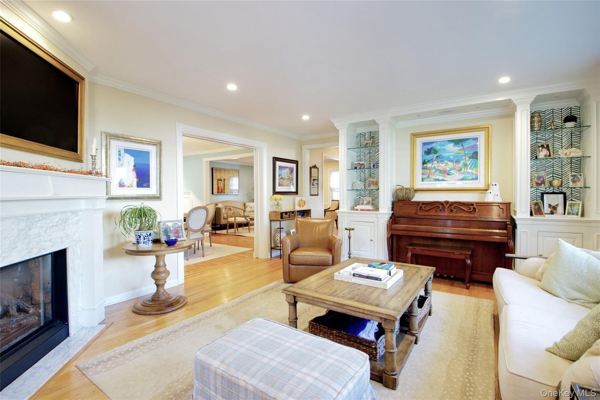 Fireplace, Interior, Living room, Piano, Recessed Lighting, Wood Texture Flooring