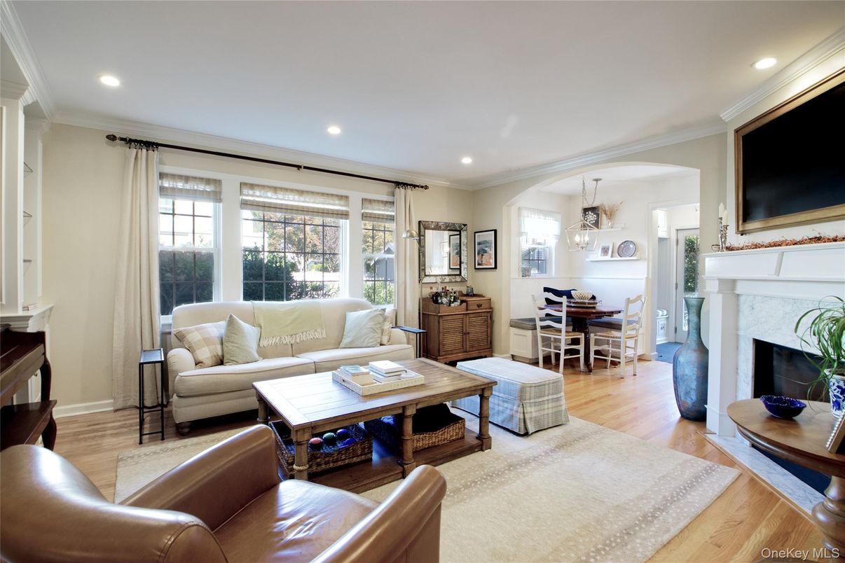 Chandelier, Dining room, Fireplace, Interior, Living room, Recessed Lighting, Wood Texture Flooring